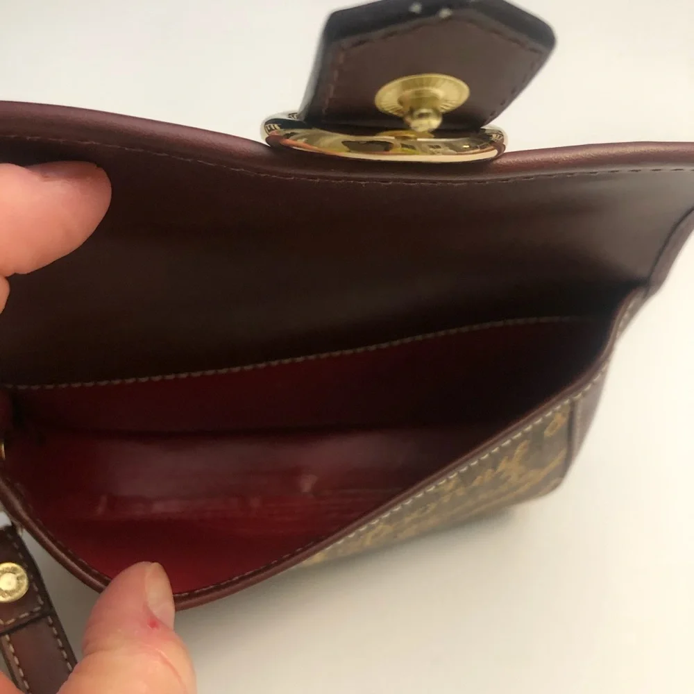 Dooney & Bourke vintage flap wristlet